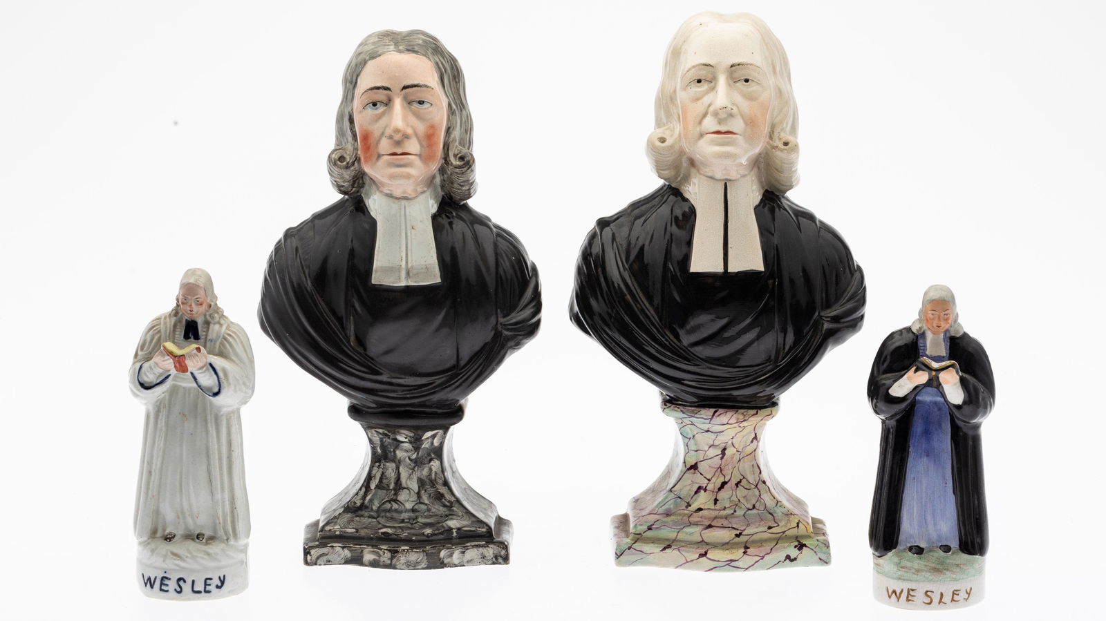 Group of John Wesley Staffordshire: Property from the Collection of John and Virginia Duncan, Savannah, GA Description: Two Staffordshire Busts of John Wesley and Two Standing Figures of John Wesley, comprising a 11 7/8 in. portrait