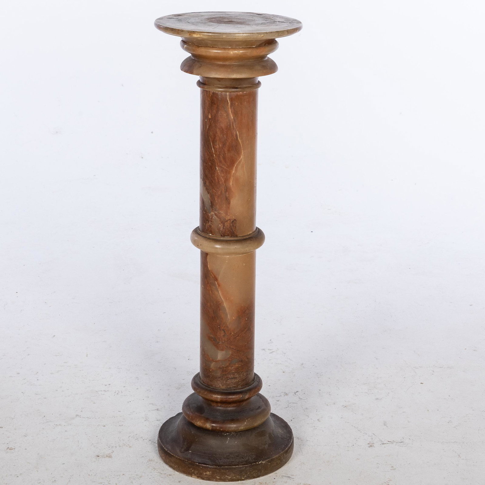 Agate Pedestal, 19th C: Property from the Collection of John and Virginia Duncan, Savannah, GA Description: Agate Pedestal, 19th C, of circular columnar form. Measurements: Height: 36 1/4 in. x Width: