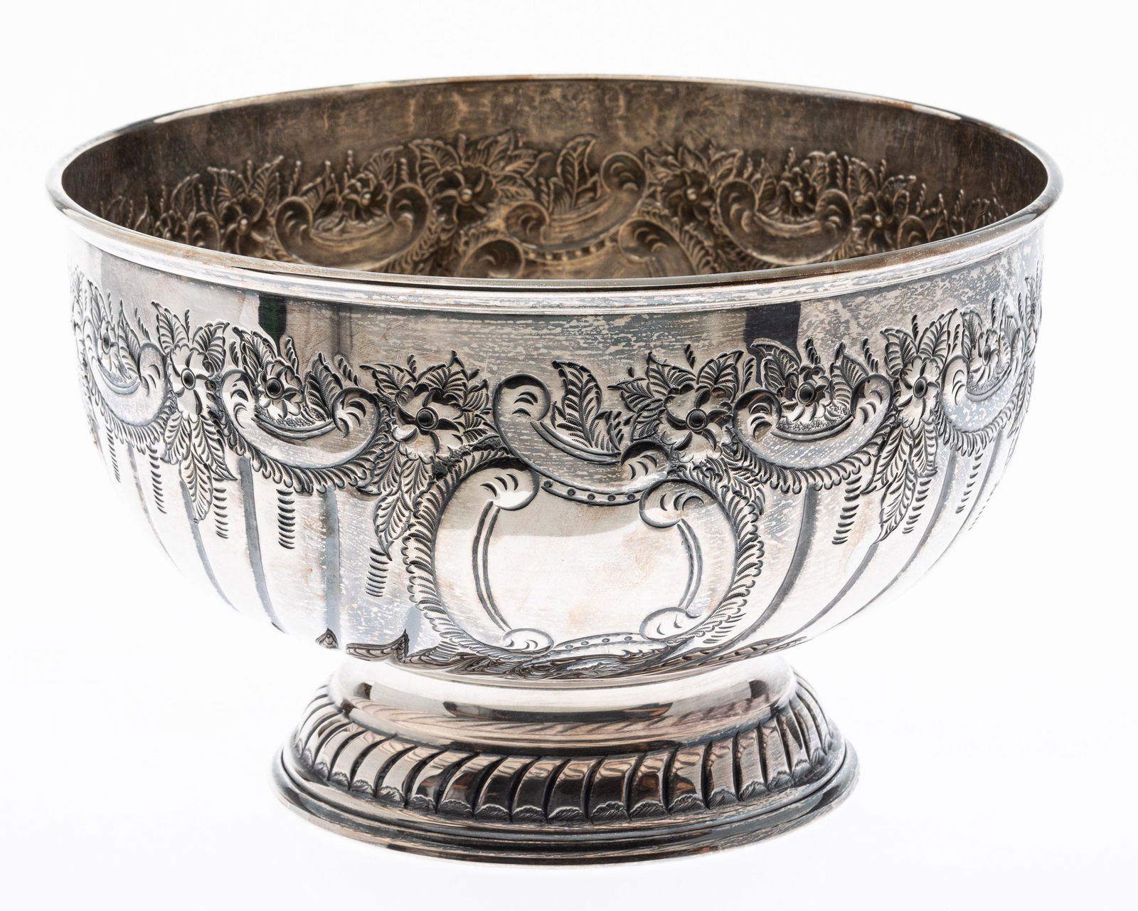 Sheffield Plate Punch Bowl: Property from a Private Collection, St. Simons Island, GA Description: Sheffield Plate Punch Bowl, decorated with flowers and scrolls, marked 'Made in Sheffield England' on underside. Me