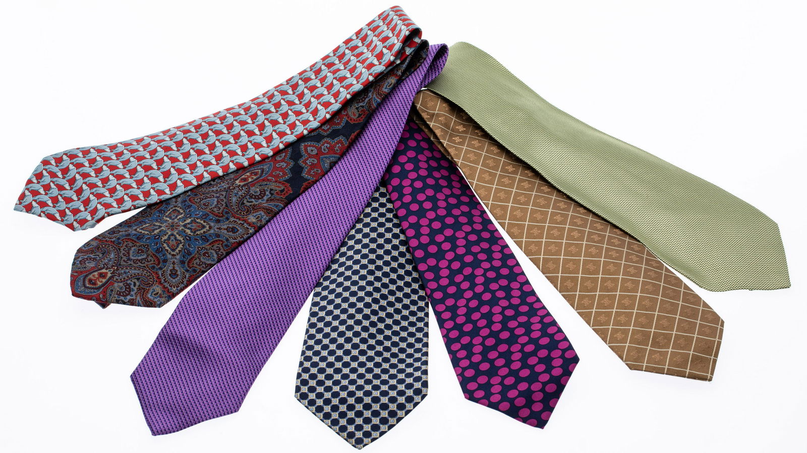 7 Silk Ties Including Chanel, Gucci, Celine & Ricci: Property from a Private Collection, Palm Beach Florida Description: 7 Various Silk Ties including Chanel, Gucci, Celine and Ricci, one Chanel tie with fuchsia polka dots on a blue ground, Chanel t