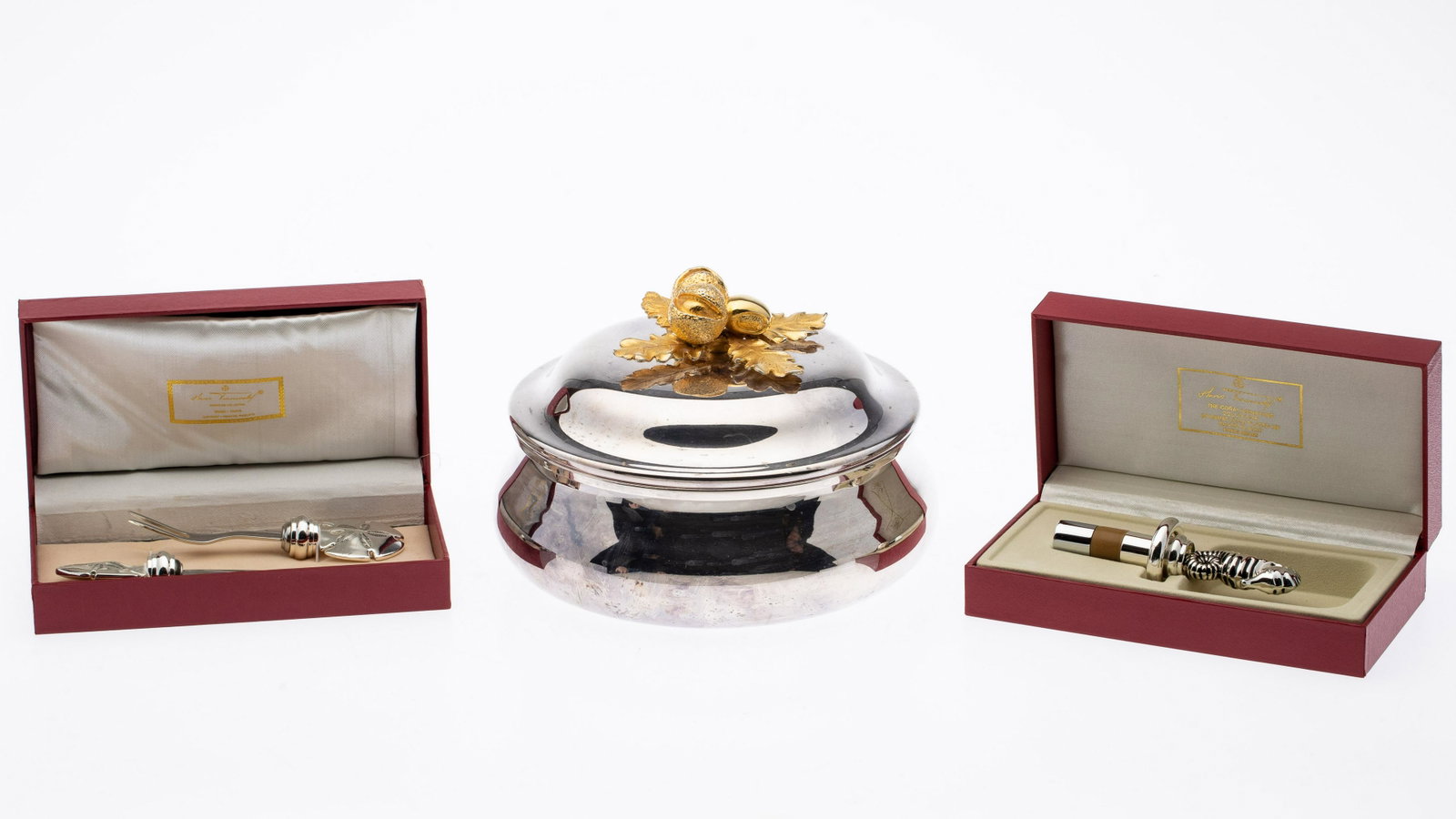 Turnwald Wine Stopper, Spreader, Broggi Acorn Bowl: Property from a Private Collection, Palm Beach Florida Description: Hans and Anne Turnwald Wine Stopper, Spreader set, and a Broggi Acorn Bowl, the bottle stopper and cocktail set in fitted boxes