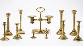 Group of 11 Brass Candlesticks