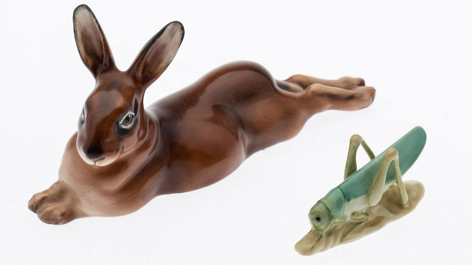 Royal Doulton Hare and Herend Grasshopper: Property from an Estate, Chicago and Savannah Description: Royal Doulton Hare and Herend Grasshopper, a reclining hare marked 'Made in England Royal Doulton, England Bone China', and numbered '259