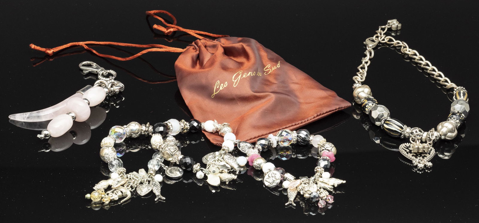 Group of Beaded Jewelry, including Les Gens du Sud: Property from a Private Collector, Palm Beach and East Hampton Description: Group of Beaded Jewelry, including Les Gens du Sud, comprising three beaded charm bracelets (marked 'Paradise-Bejoux.com