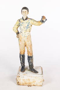 Painted Cast Iron Lawn Jockey: Property from a Private Collection, Bluffton, SC Description: Painted Cast Iron Lawn Jockey, of characteristic form on a square base. Measurements: Height: 46 in. x Width: 23 in