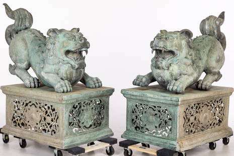 Pair of Large Bronze Fu Dog Garden Sculptures: Property from a Private Collection, Hilton Head Island, SC Description: Pair of Large Bronze Fu Dog Garden Sculptures, on pierced rectangular bases. Measurements: Height: 43 in.