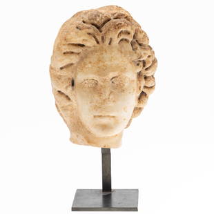 Roman Marble Male Head, c Late 2nd-Early 3rd C. A.D.: Property from a Private Collection, Savannah, GA Description: Roman Marble Male Head, c. Late 2nd - Early 3rd C. A.D., depicted beardless, turned slightly to his right, his deeply-drilled hair ups