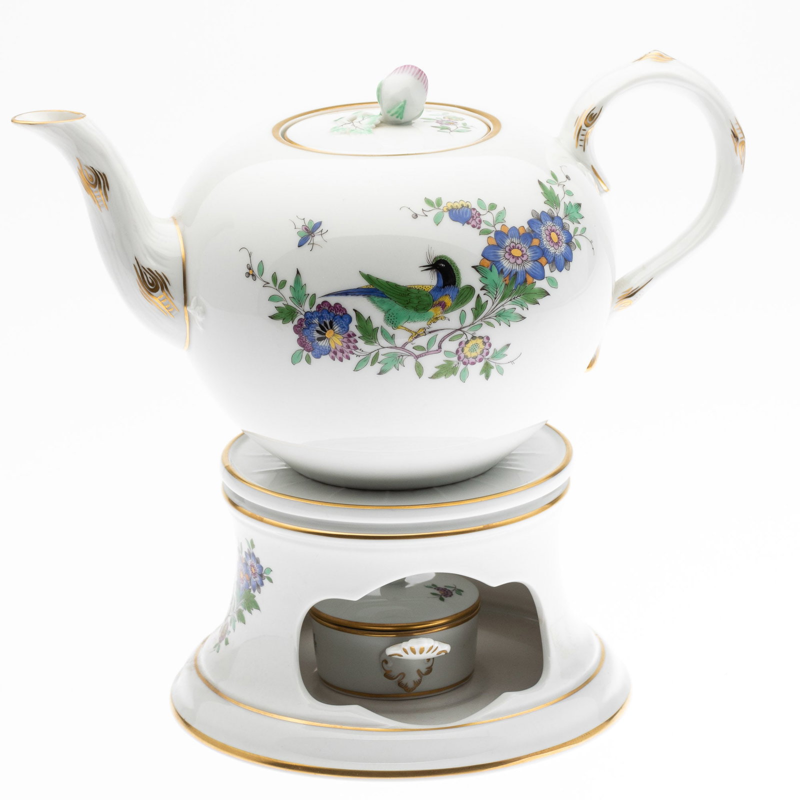 Meissen Porcelain Veilleuse: Description: Meissen Porcelain Veilleuse, comprising a teapot, stand with lid and warmer, marked on the underside 465110/37 on stand and warmer, marked 465110/73 on the teapot, all with underglaz