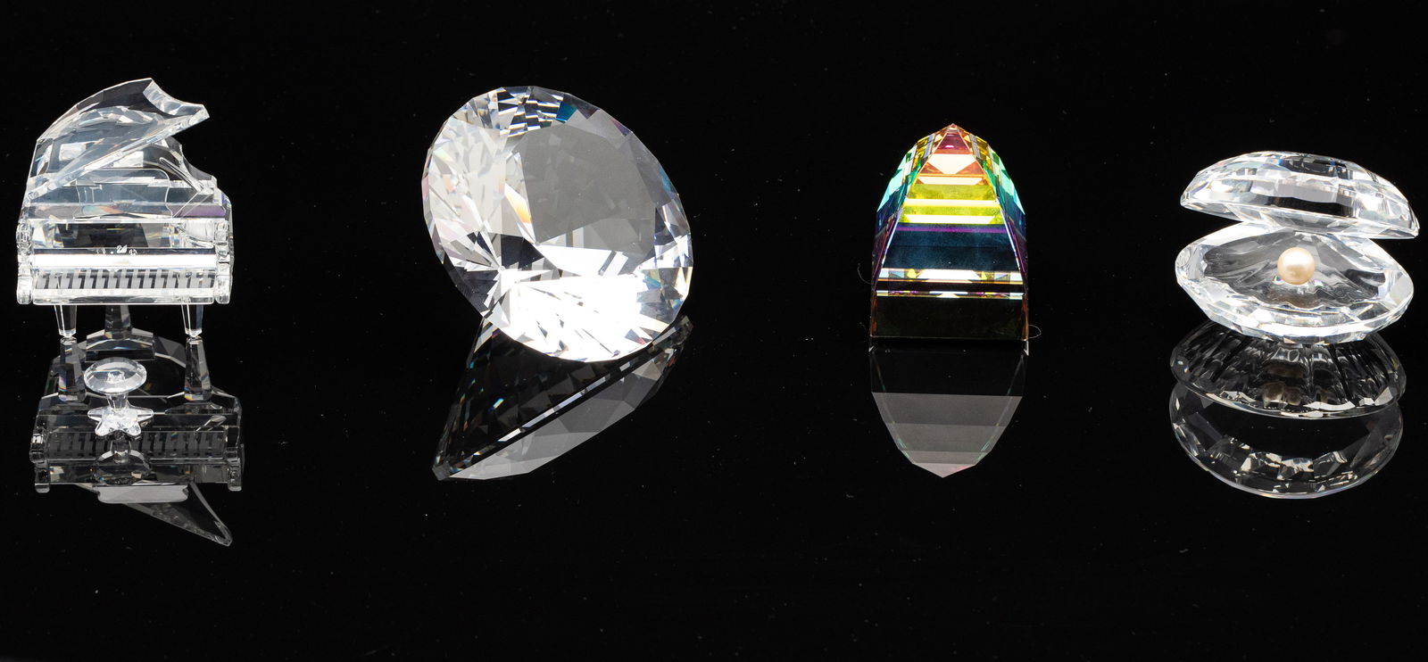 Swarovski Piano, Clamshell, Diamond & Pyramid: Property from a South Carolina Estate Description: Swarovski Piano, Clamshell with Pearl, Diamond and Pyramid, comprising a clamshell with pearl (2 1/4 in. x 2 1/2 in.), grand piano with stool, ra