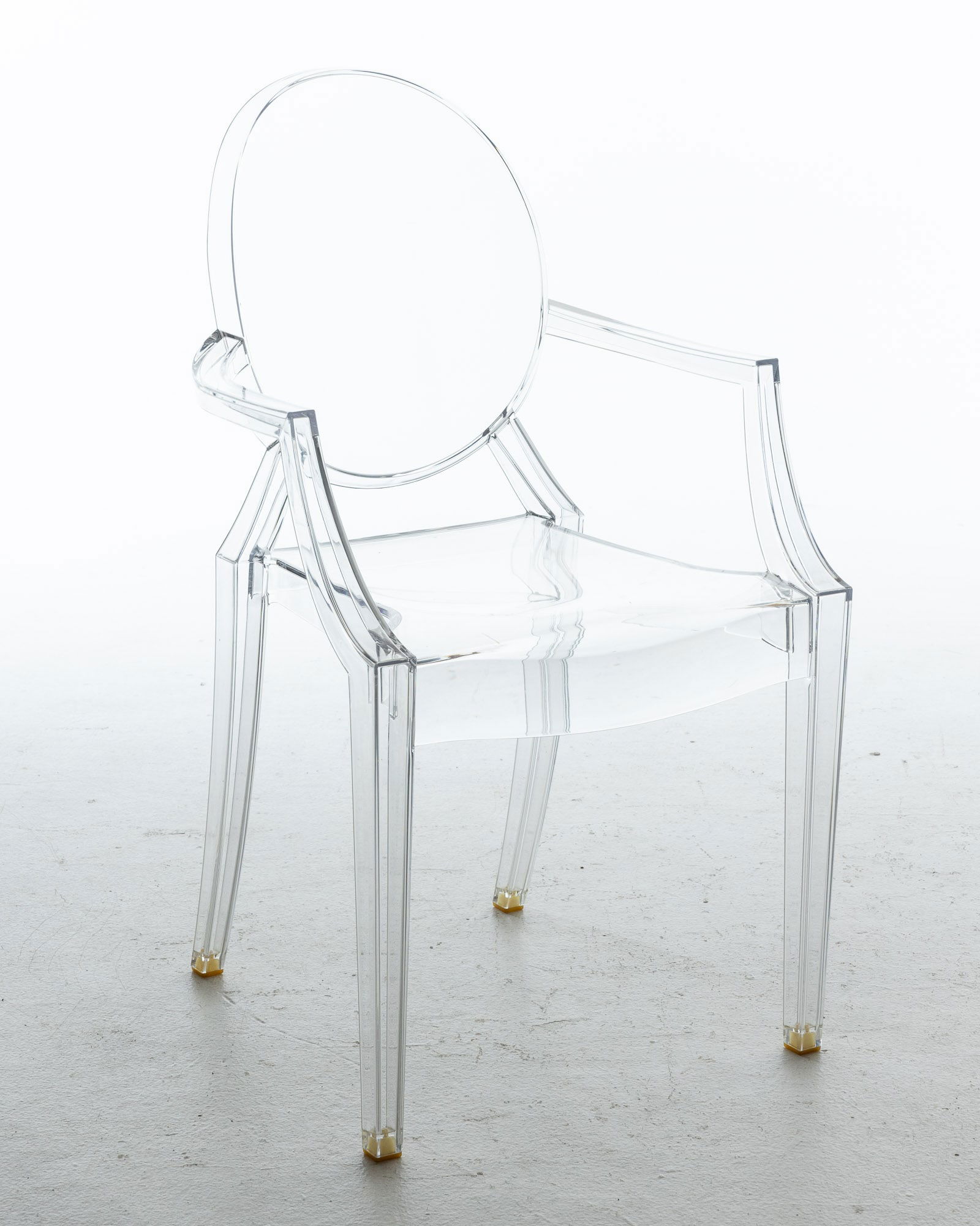 Philippe Starck Louis Ghost Lucite Armchair: Property from the Estate of Jeannie Sims, Savannah, GA and Charleston, SC Description: Philippe Starck Louis Ghost Lucite Armchair for Kartell, marked on back of seat. Measurements: