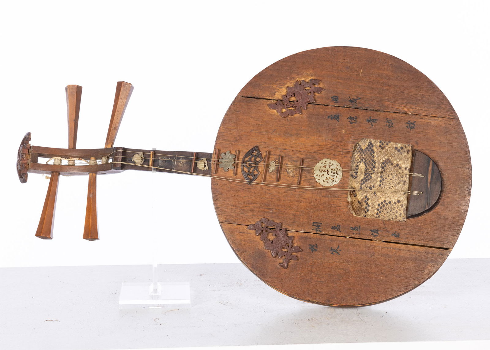 Chinese Moon Guitar, Late 19th/Early 20th C: Property from the Estate of a Former General Electric International Executive, Hilton Head Island, SC Description: Chinese Yueqin or Moon Guitar, Late 19th/Early 20th Century, having a round sound