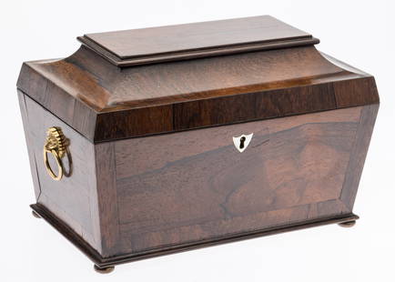 English Rosewood Tea Caddy, 19th C: Description:  English Rosewood Tea Caddy, 19th C, of sarcophagus form with four squat bun feet, mother-of-pearl escutcheon, and later gilt metal lion-form handles. The inlaid interior with two lid