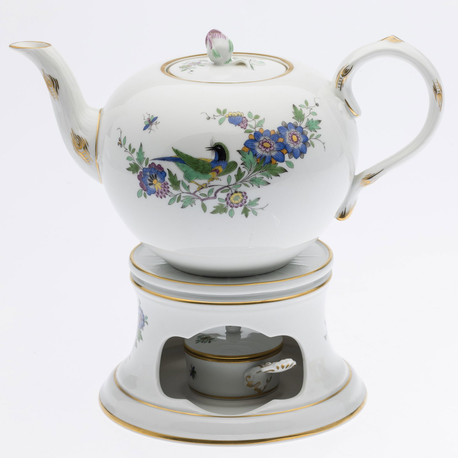 Meissen Porcelain Veilleuse: Description: Meissen Porcelain Veilleuse, comprising a teapot, stand with lid and warmer, marked on the underside 465110/37 on stand and warmer, marked 465110/73 on the teapot, all with underglaz