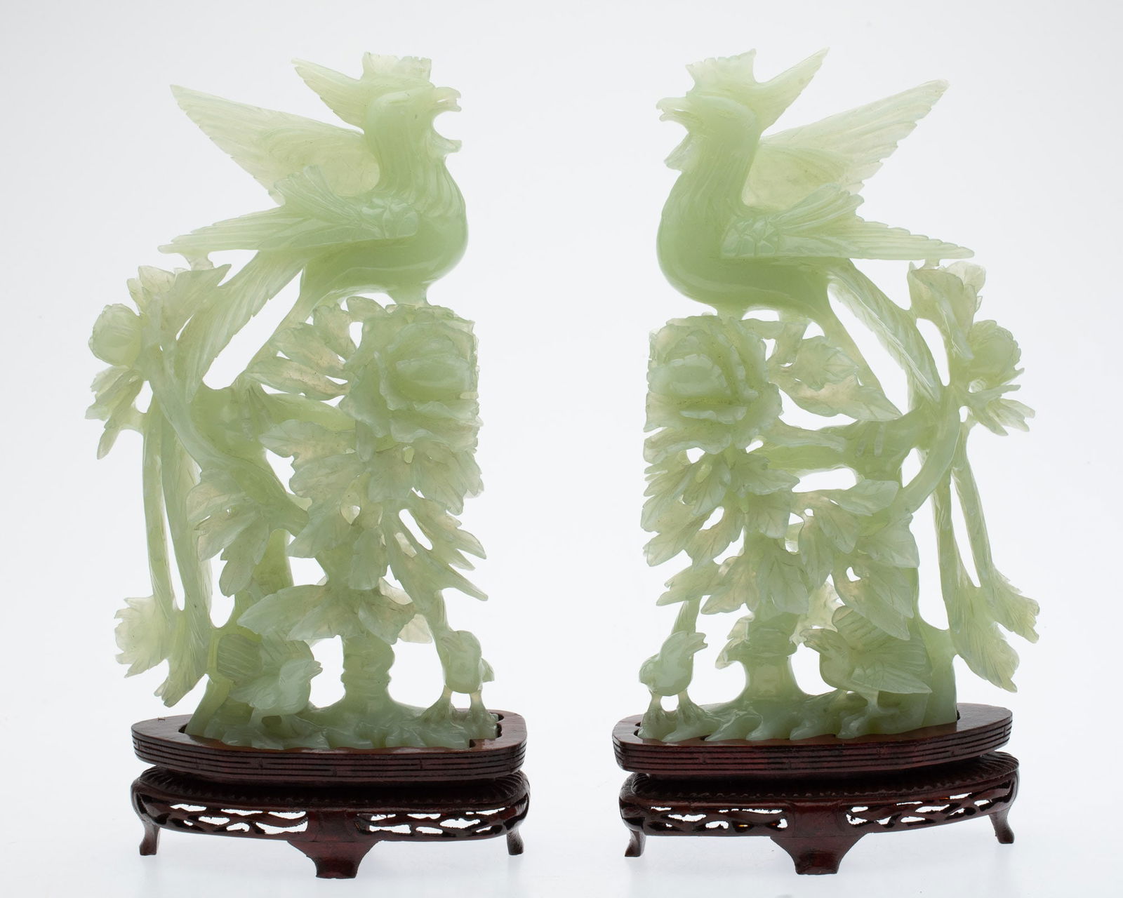 Pair of Carved Jade Birds: Property from the Estate of a Former General Electric International Executive, Hilton Head Island, SC Description: Pair of Carved Jade Birds, a pair of carved jade birds perched on flowering branc