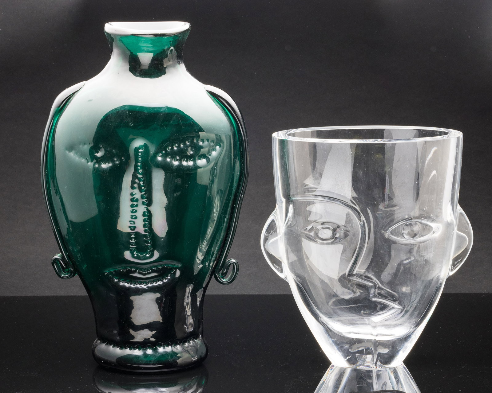 Martti Rytkonen for Orrefors Ramses Vase & Another: Property from the Estate of Lorlee and Arnold Tenenbaum Description: Martti Rytkonen for Orrefors "Ramses" Vase and Another , comprising an Orrefors clear glass sculptural "Ramses" vase with carve