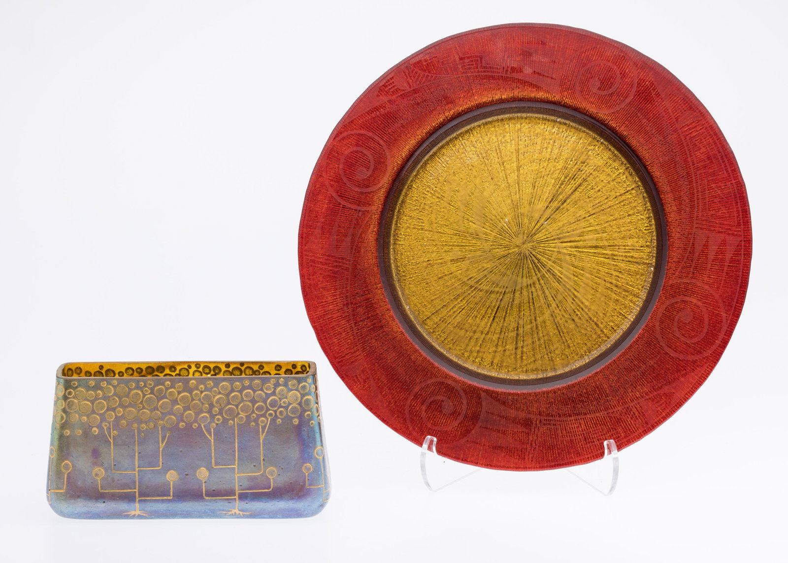 Unsigned Art Glass Platter and Rectangular Vase: Property from the Estate of Lorlee and Arnold Tenenbaum Description: Unsigned Art Glass Platter and Rectangular Vase, comprising a red and yellow etched glass platter and an iridescent and gold pa