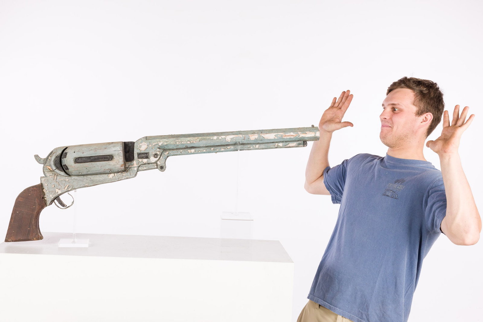 Large Wood Pistol, Possible Trade Sign: Property from a Private Collection, Bridgehampton, NY Description: Large Wood Pistol, Possible Trade Sign, large painted and carved wood pistol. Measurements: Height: 13 in. x W