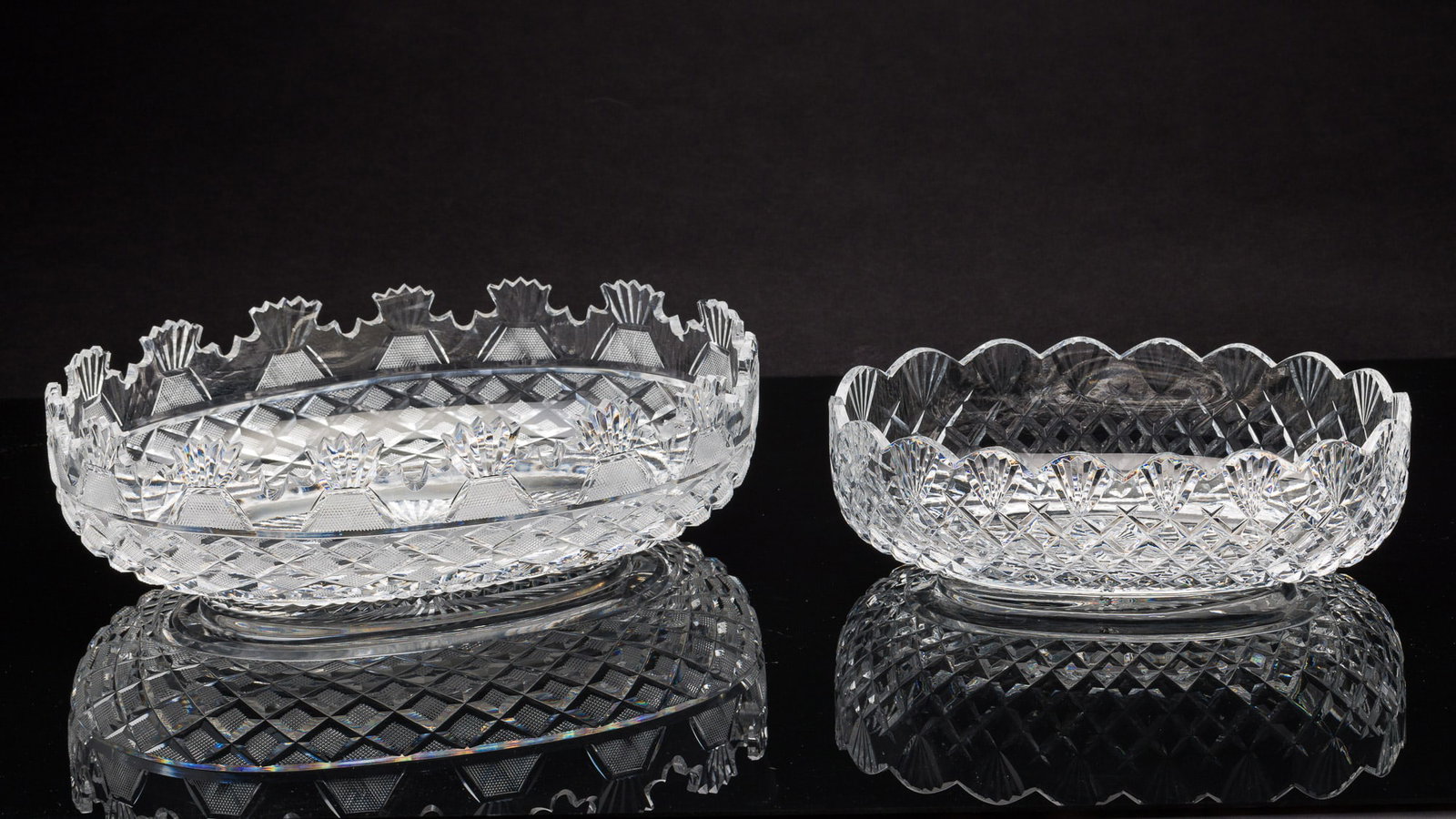 Two Waterford Oval Bowls: Description: Two Waterford Oval Bowls, comprising a 4 1/8 in. x 13 3/4 in. x 9 1/2 in. Waterford oval centerpiece bowl, marked on underside, and a 3 1/2 in. x 11 in. x 8 1/2 in. oval bowl, marked