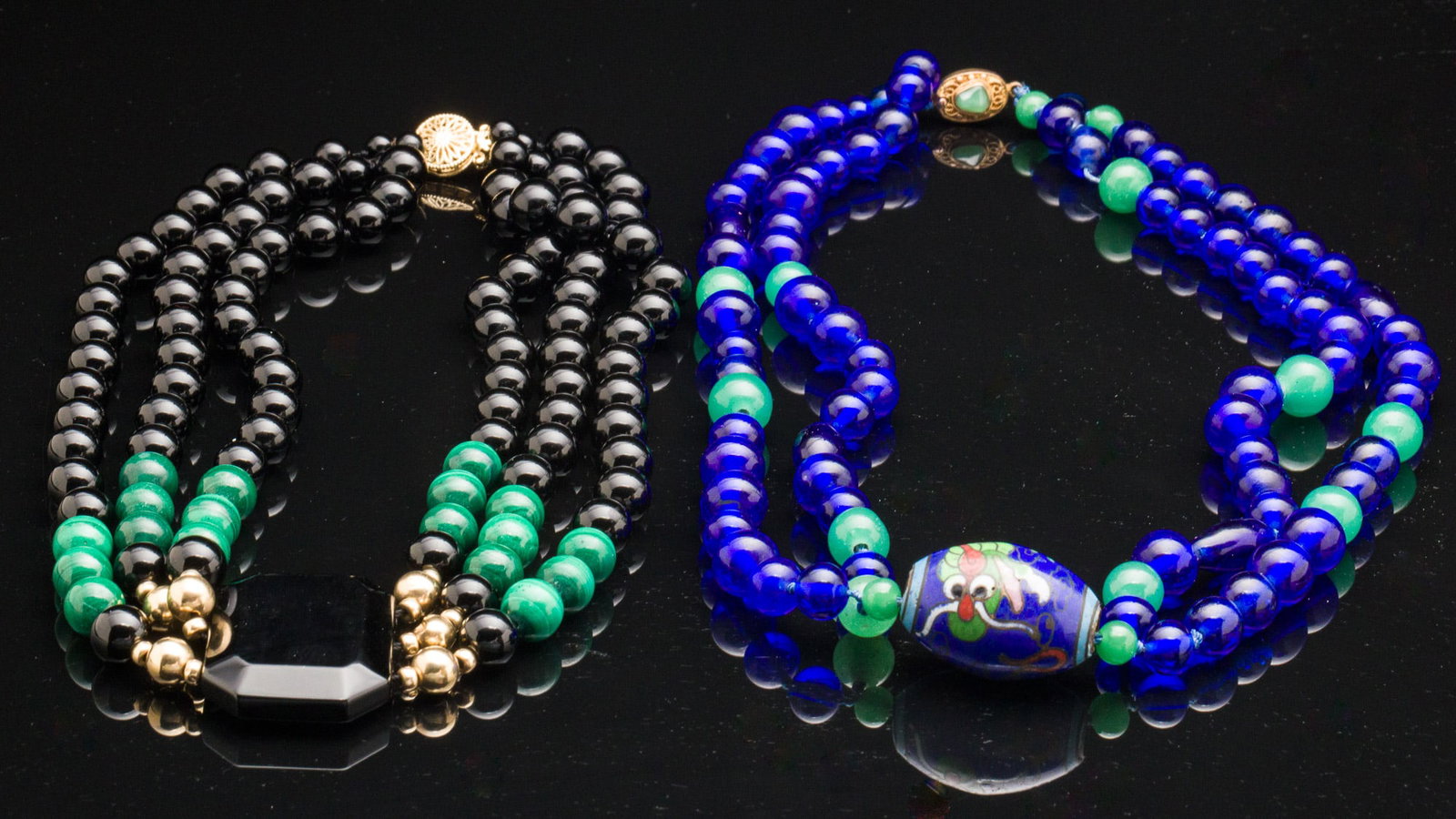 Onyx, Malachite & Gold Necklace & Beaded Necklace: Property of a Hilton Head Island, SC Estate Description: Onyx, Malachite & Gold Necklace & Beaded Necklace, a triple strand onyx, malachite and gold beaded necklace with rectangular onyx pendant a