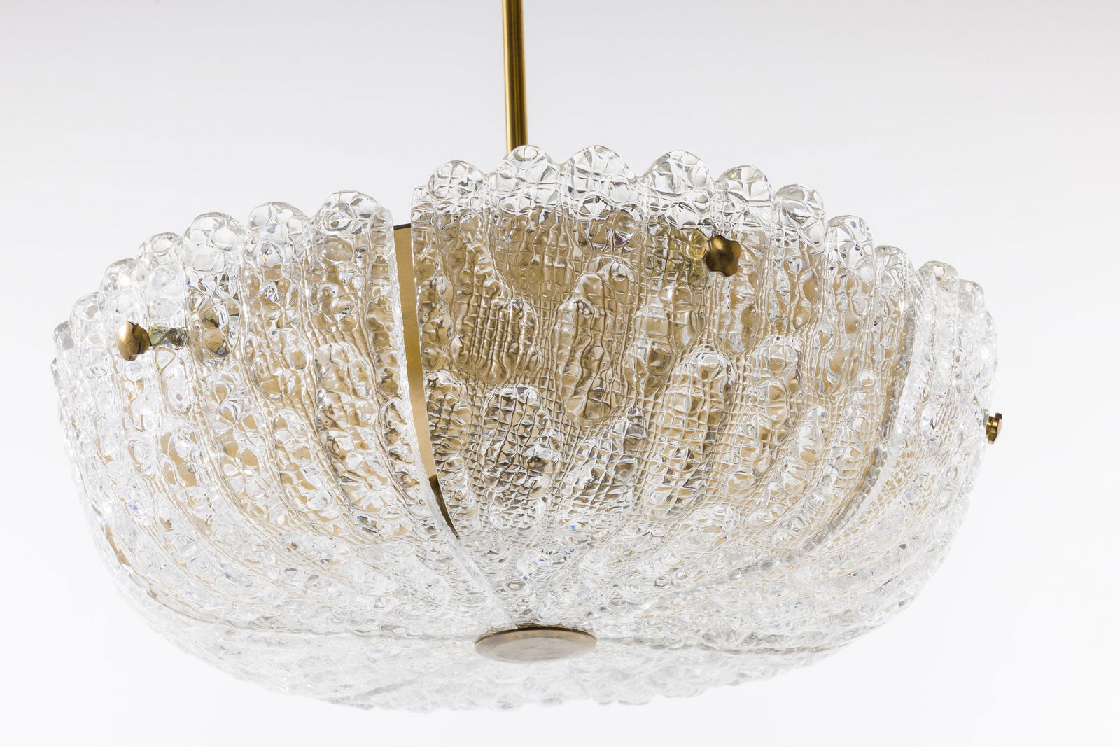 Carl Fagerlund Orrefors Molded Glass Chandelier: Property from a Collector, Philadelphia and New York Description: Carl Fagerlund Orrefors Molded Glass Chandelier, c. 1945, in 6 segments with gilt-metal support. Measurements: