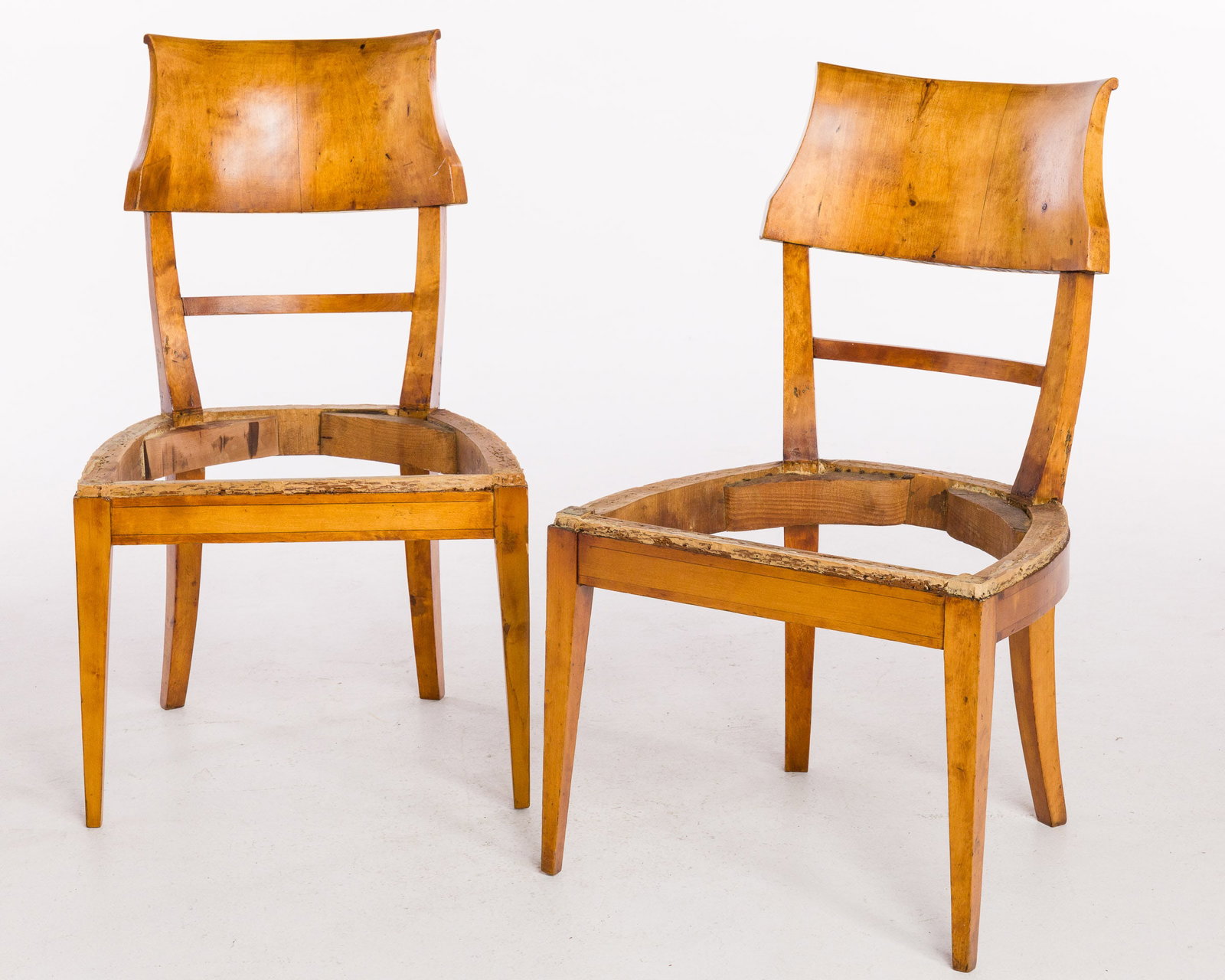 Pair of Baltic Birch Side Chairs, late 19th Century: Property from a Collector, Philadelphia and New York Description: Pair of Baltic Birch Side Chairs, late 19th Century, each with concave backrest and square tapering legs. Measurements: