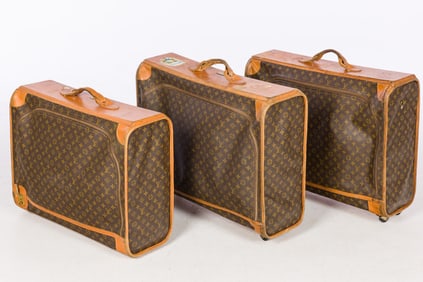 Three Louis Vuitton Suitcases