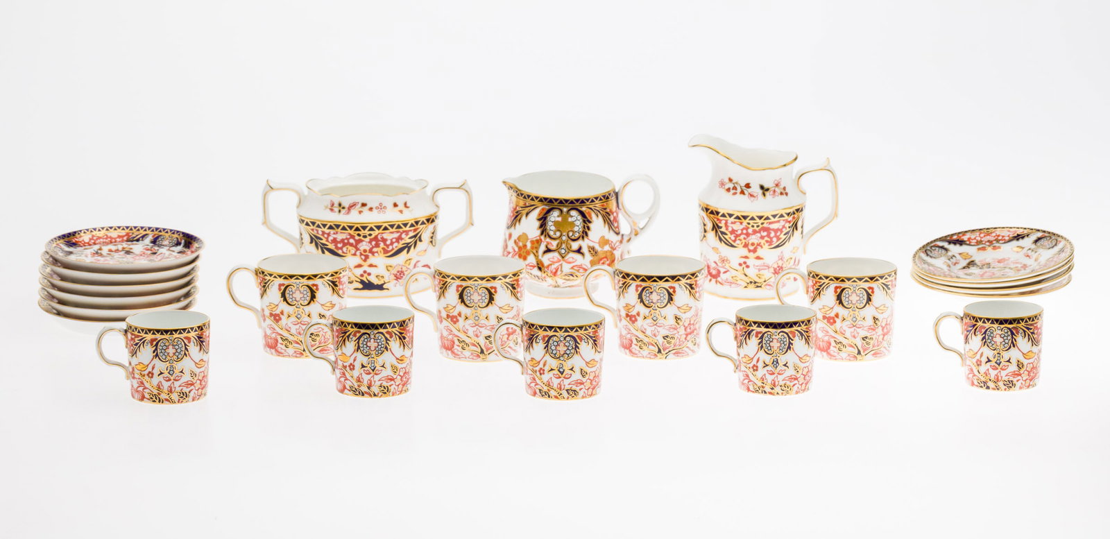 Group of Royal Crown Derby: Property of a Private Collector, Savannah, GA Description: Group of Royal Crown Derby, comprising 4 teacups with saucers, 5 demitasse cups with 6 saucers, two cream pitchers, and a sugar jar (lack