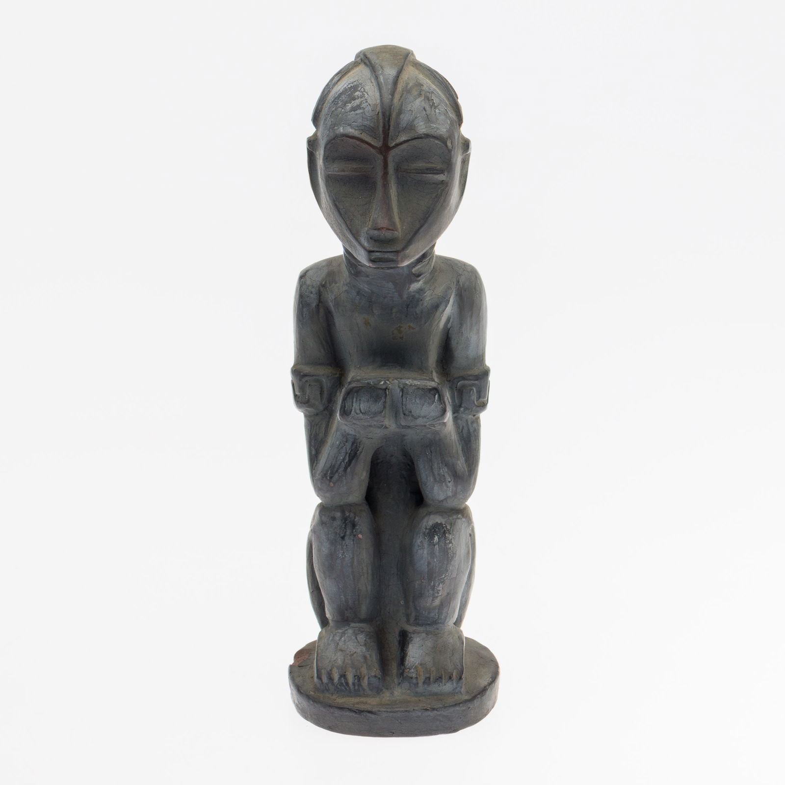 Marie Cosindas (MA, 1923-2017), Terracotta Figure: Property of a Private Collector, Savannah, GA Description: Marie Cosindas (MA, 1923-2017), Painted Terracotta Figure, signed 'Cosindas' along edge of base, depicting a seated tribal figure on a ci