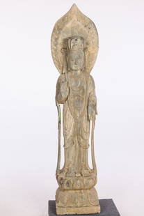 Carved Stone Guanyin Sculpture, 20th C: Property from the Betty Ann Mandus-Lane Revocable Trust, Port Orange, FL Description: Carved Stone Guanyin Sculpture, 20th C, the figure standing on a lotus base. Measurements: