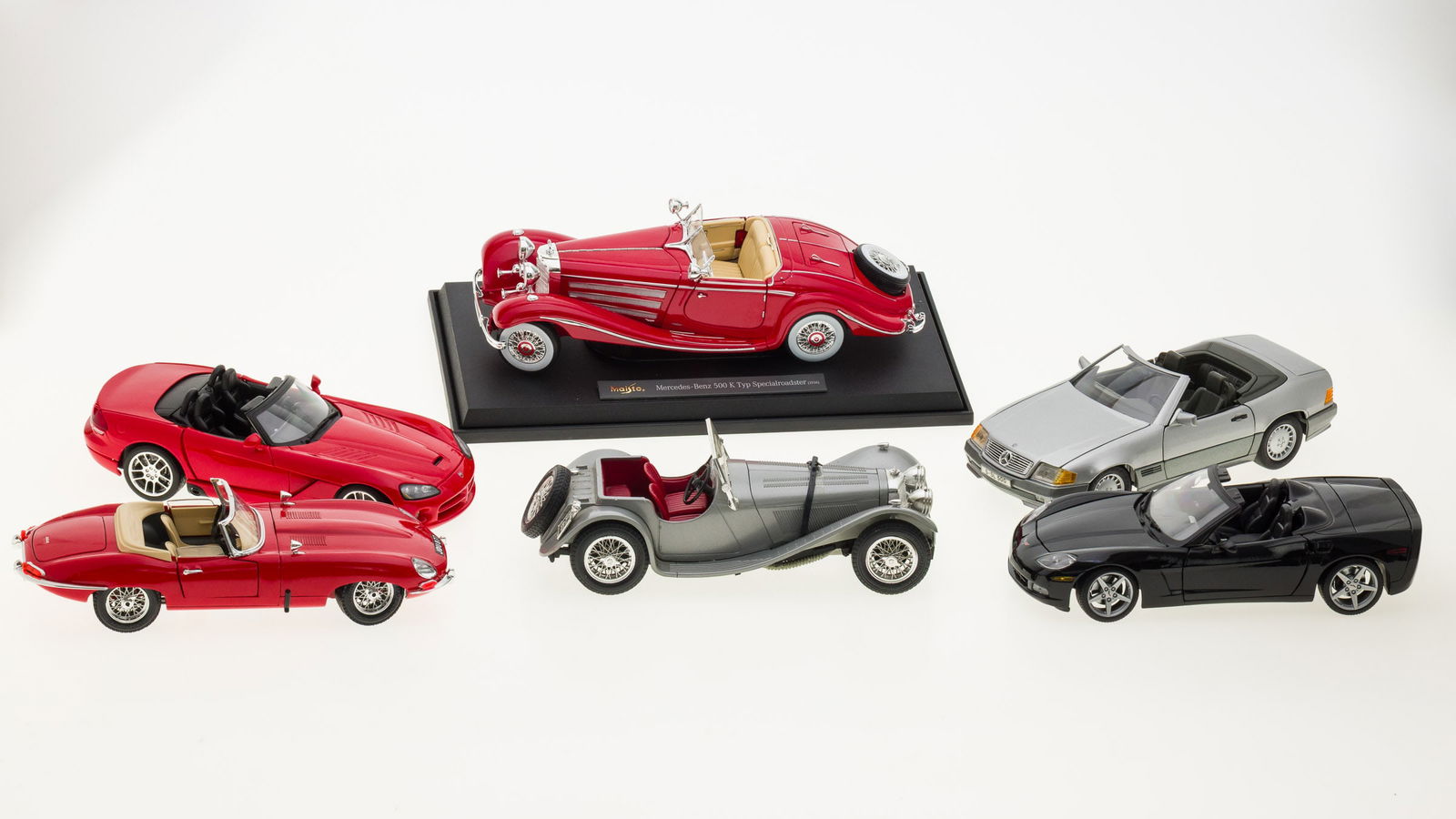 6 Collectible Model Cars: Property from the Estate of Judge Joel M. Flaum, Chicago, IL Description: 6 Collectible Model Cars, comprising a 2005 Chevy Corvette, 1961 Jaguar E, Dodge Viper, 1989 Mercedes-Benz 500 SL, 1931 Ja