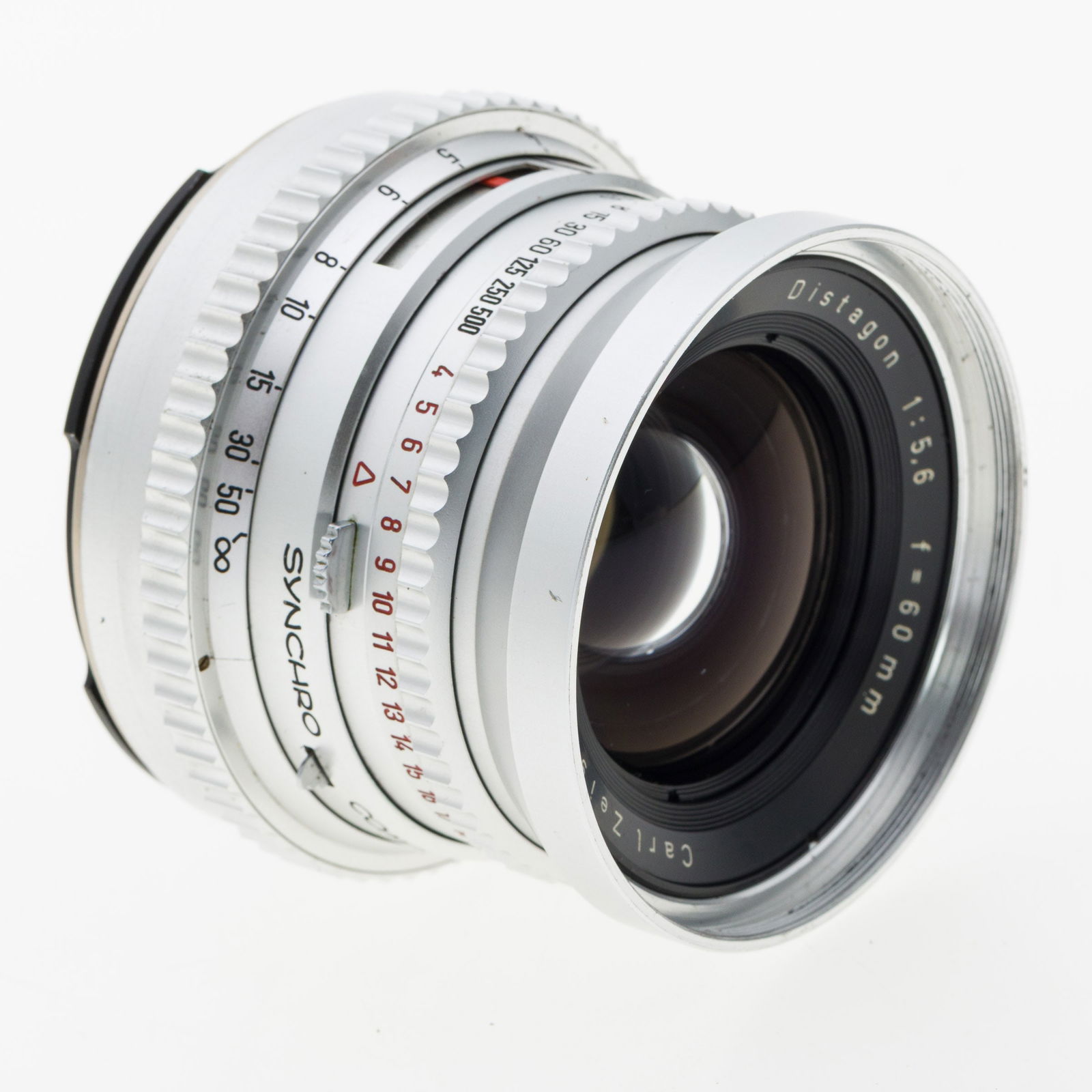 Carl Zeiss Sincro Compr Distagon 60mm f5.6: Property from the Collection of Ray C. Cottingham Description: Carl Zeiss Sincro Compr Distagon 60mm f5.6, SN 2628590, with front and associated back cap. According to the consignor the mot