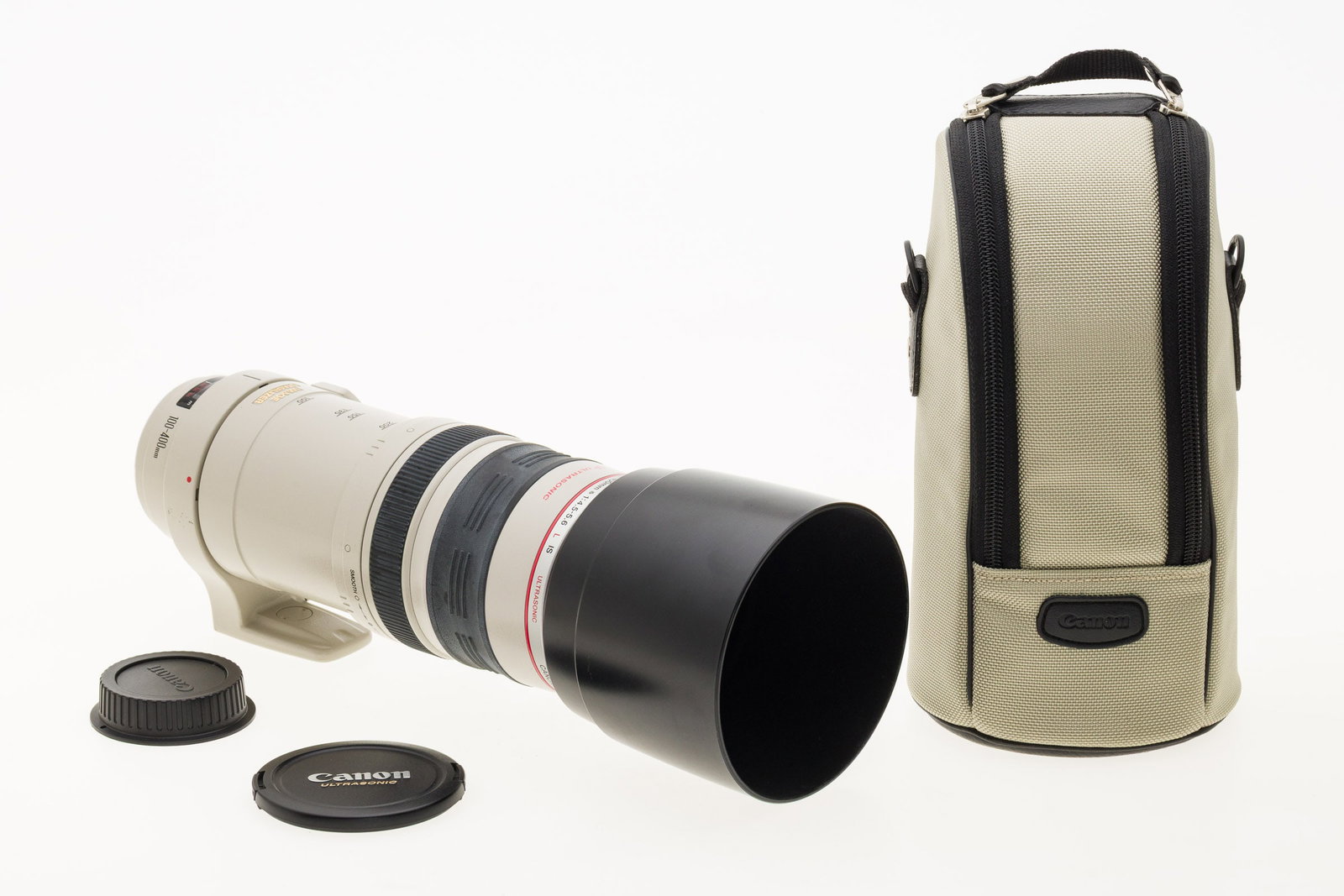 Canon EF 100-400mm f4.5-5.6: Property from the Collection of Ray C. Cottingham Description: Canon EF 100-400mm f4.5-5.6, SN 269731, with caps, shade & case. According to the consignor the motorized still cameras were u