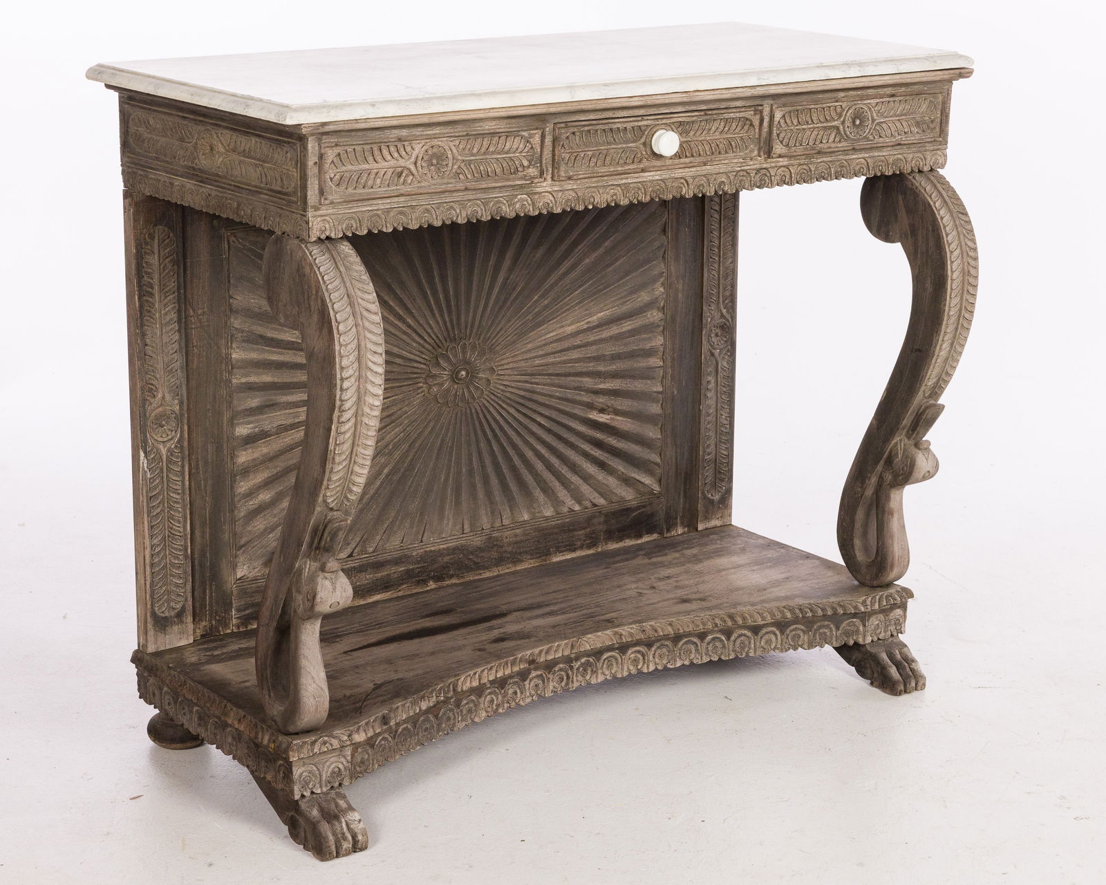 Anglo Indian Hardwood Marble Top Console Table: Property from a Private Collection Richmond Hill, GA Description: Anglo Indian Hardwood Marble Top Console Table, with rectangular marble top above a carved frieze with drawer, raised on scrolled