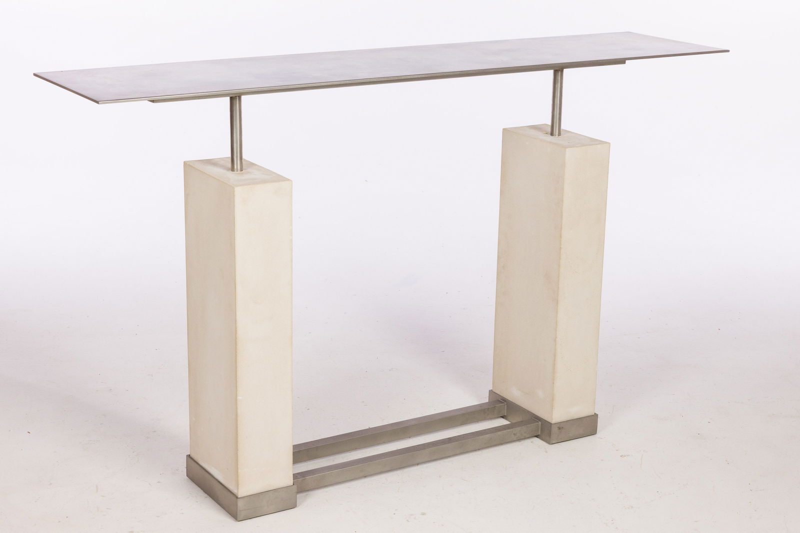 Michael Heltzer Metal and Cast Stone Console Table: Property from a Private Collector, Spring Isand, GA and Philadelphia Description: Michael Heltzer Metal and Cast Stone Console Table, the metal rectangular top on two cast stone bases. Provenance: