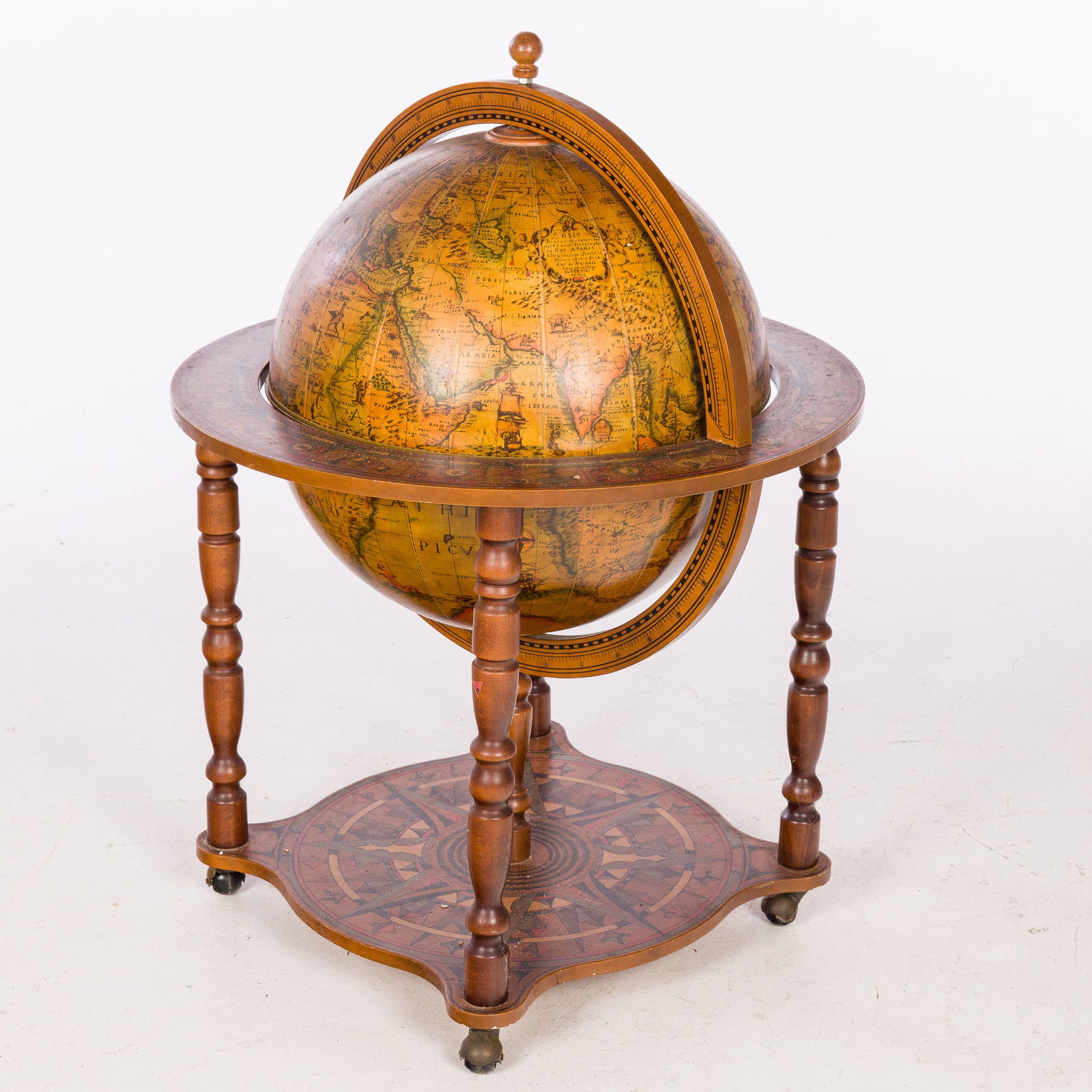 Vintage Globe-Form Bar Cart: Description: Vintage Globe-Form Bar Cart, decorated with zodiac symbols and a compass on the bottom, the globe swivels and opens to an interior fitted to accept glassware, on casters. M