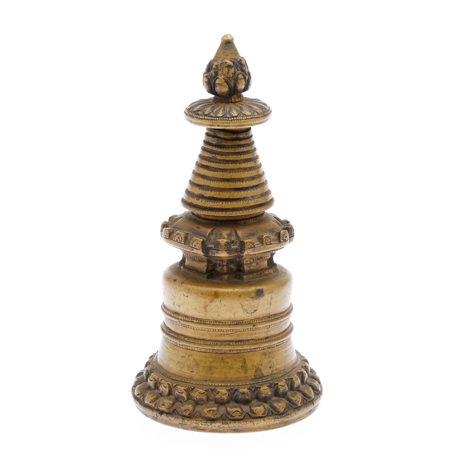 Bronze Tibetan Stupa: Description: Bronze Tibetan Stupa, stacked form with flower motif on bottom. Measurements: Height: 6 5/8 in. x Width: 3 1/8 in. x Depth: 3 1/8 in.
