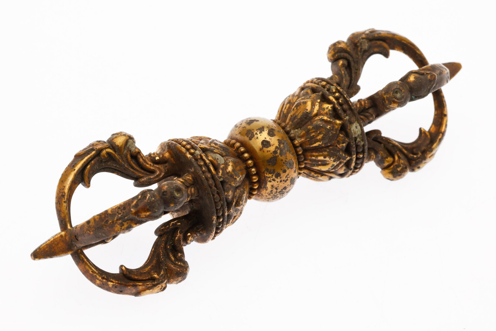 Chinese/Tibetan Gilt Bronze Vajra: Property of a Private Collector, Savannah, GA Description: Chinese/Tibetan Gilt Bronze Vajra, of characteristic form. Measurements: Height: 5 1/2 in. x Width: 1 1/2 in. x Depth: