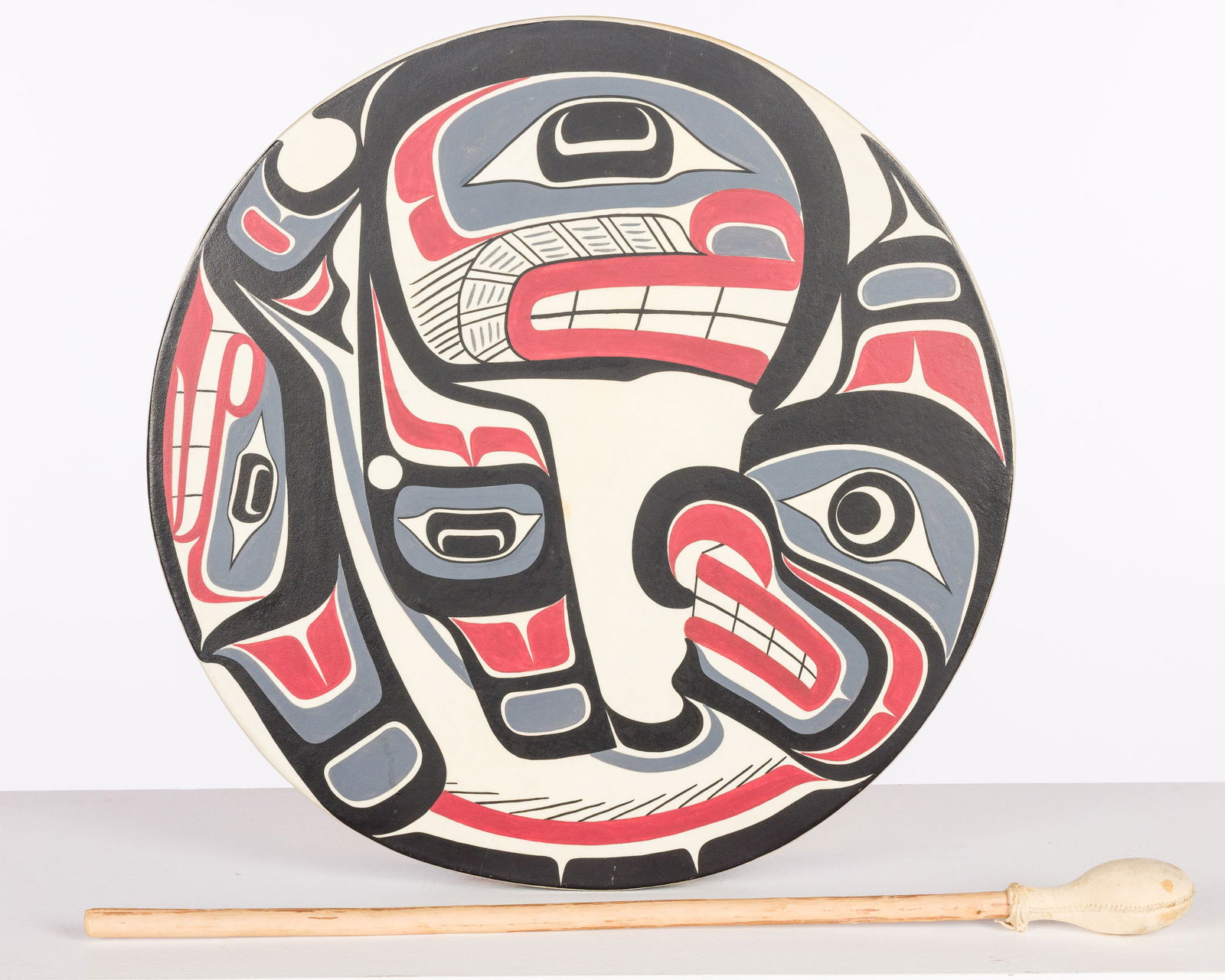 Eugene Hunt (Kwagiulth, 1946-2002) Painted Drum: Property of Private Collector, Bluffton, SC Description: Eugene Hunt (Kwagiulth, 1946-2002) Painted Drum , pencil signed on inside rim, painted hide drum with figures and birds; with mallet.