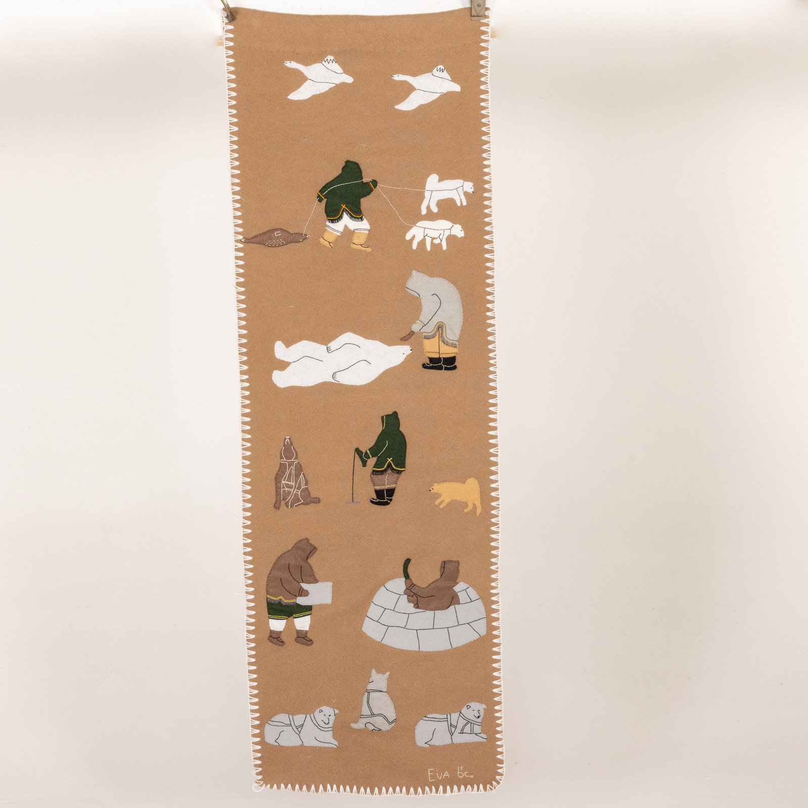 Newfoundland Felt Hanging: Property of Private Collector, Bluffton, SC Description: Newfoundland Felt Hanging, signed lower right, depicting figures and animals. Measurements: Height: 57 in. x Width: 19 i