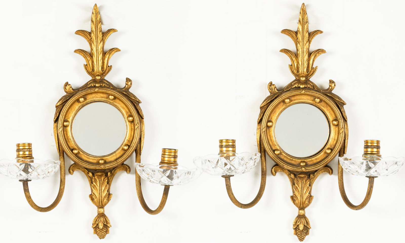 Pair of Friedman Brothers, NYC, Girandole Sconces: Description: Pair of Friedman Brothers, NYC, Girandole Mirror Sconces, each with bulls-eye mirror and two candlearms with glass bobeches, with 'Decorative Arts Inc., New York' paper labels on ver