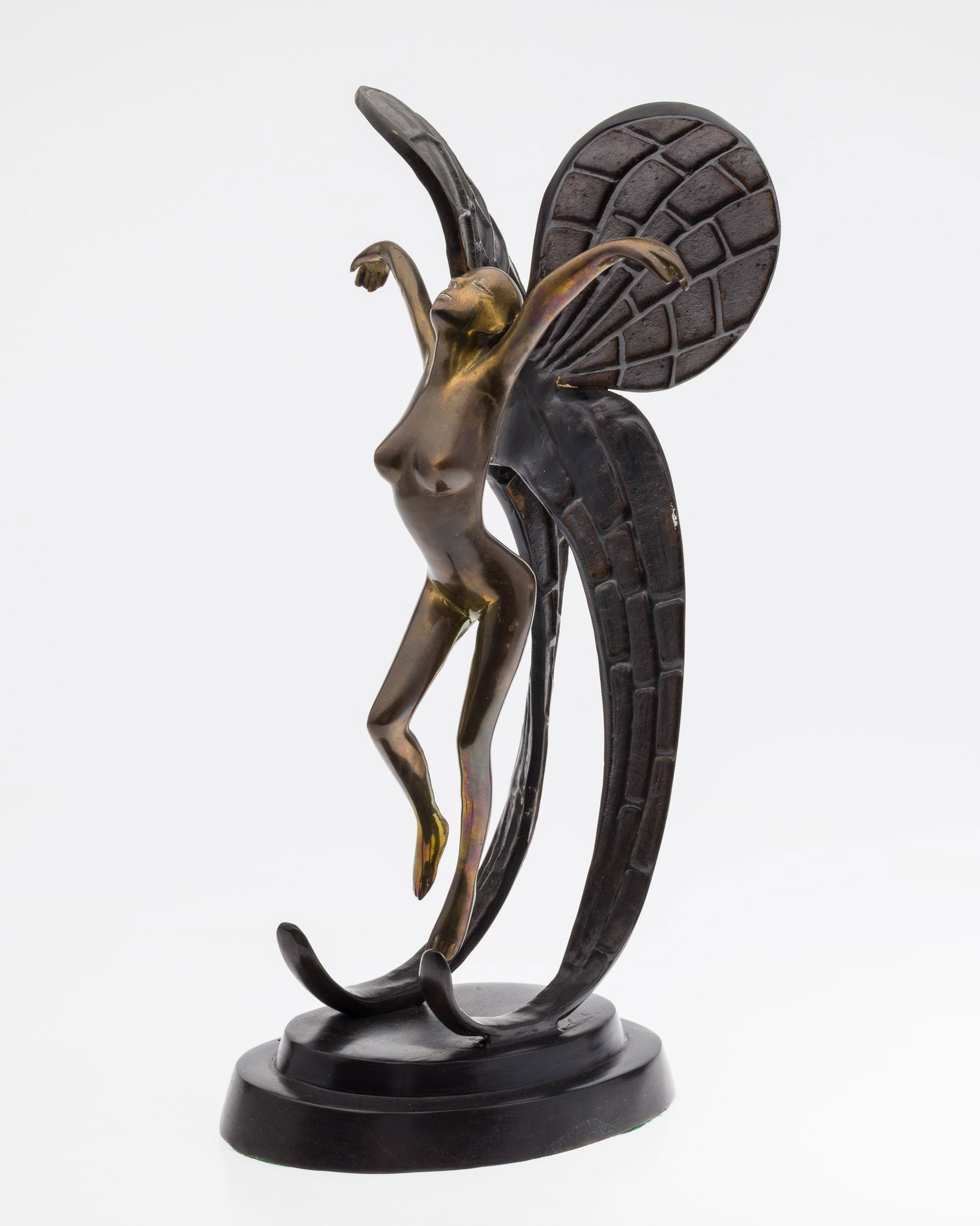 Teak Woods, Art Deco Style Woman, Bronze: Property from the Betty Ann Mandus-Lane Revocable Trust, Port Orange, FL Description: , signed 'Teak Woods Inc.' and dated 1988 on the edge of the base, depicting a flying woman with butterfly win