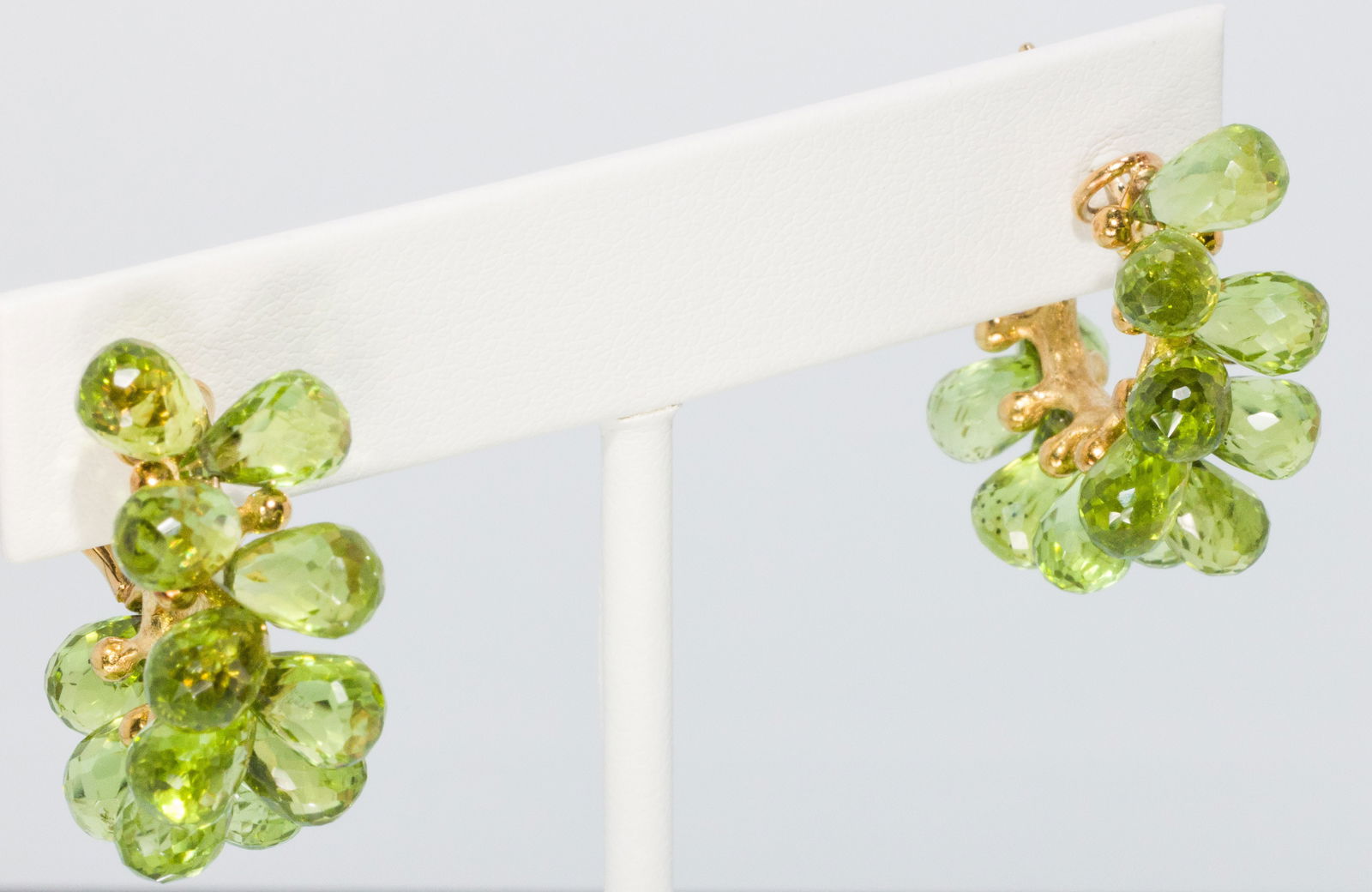 18K Gold Peridot Briolette Earrings by Joseph Murray: Property of a Private Collector, Hilton Head Island Description: 18K Yellow Gold Peridot Briolette Earrings by Joseph Murray, 18K yellow gold hoop earrings with faceted peridot briolette's, each m