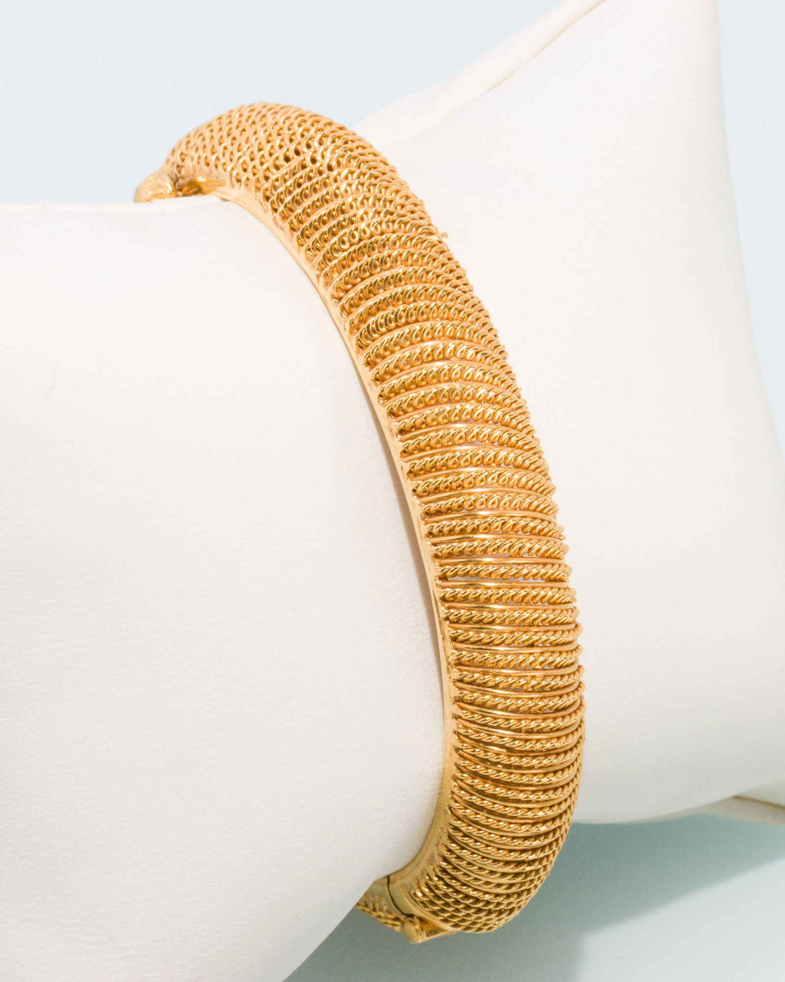 21K Gold Mesh Cable Style Bangle: Description: 21K Gold Mesh Cable Style Bangle, 21K yellow gold mesh cable style hinged bangle bracelet with screw in clasp, marked '21C, KDM' on inside. 42.74 grams overall. Measurement