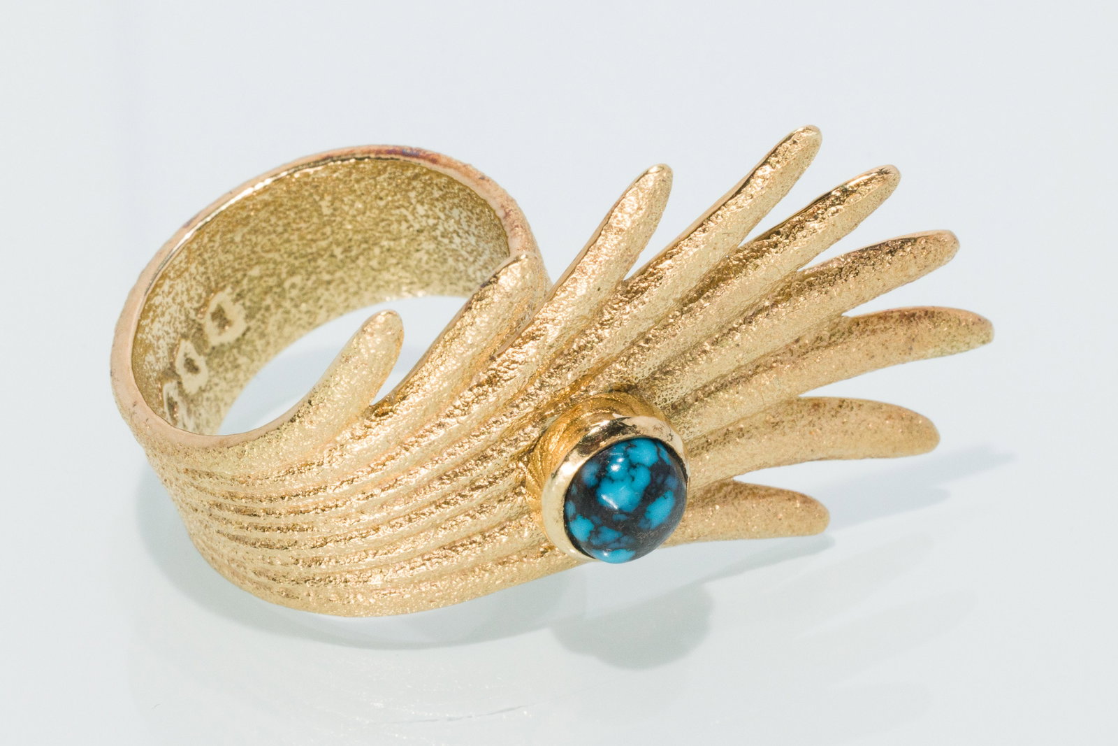 Darryl Dean Bagay 18K and Turquoise Ring, Size 8.75: Description: Darryl Dean Bagay 18K and Turquoise Ring, Size 8.75, 18K yellow gold ring with radiating free form design featuring a natural turquoise cabochon, signed 'DDB' and '18K' on inside of