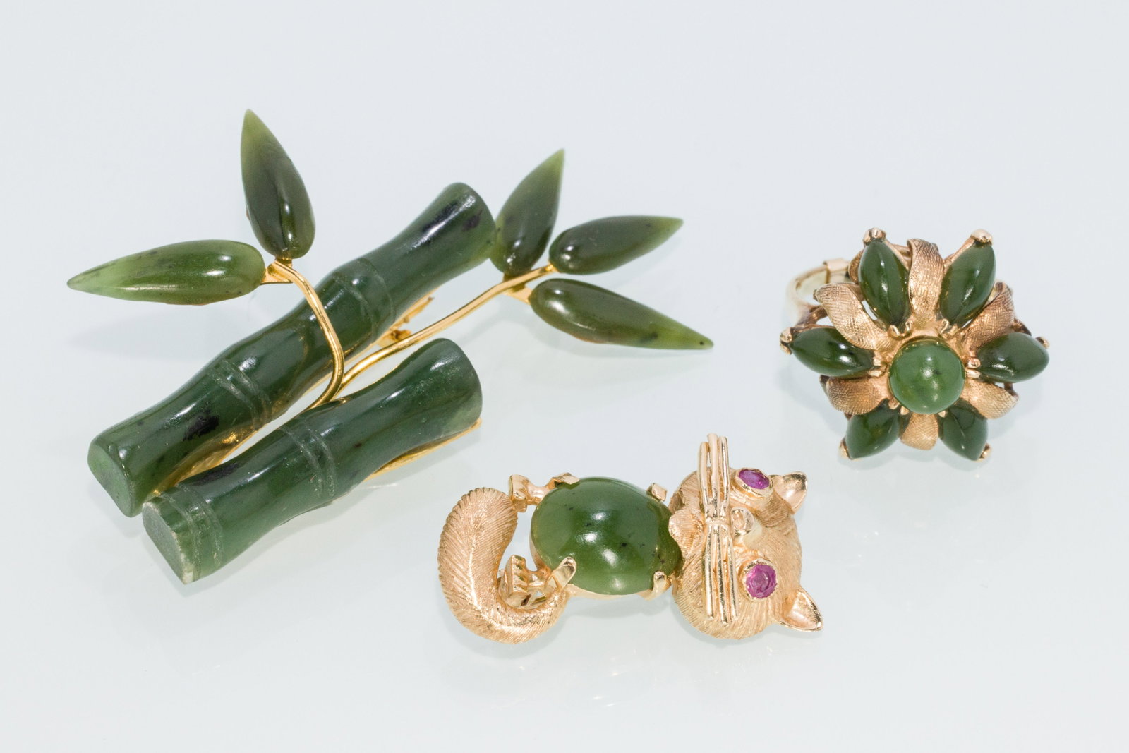 14K Cat Pin, 14K Jade Ring, and Bamboo Jade Pin: Property of a Private Collector, Savannah, GA Description: 14K Cat Pin, 14K Jade Ring, and Bamboo Jade Pin, comprising a 14K yellow gold and jade cat pin with ruby eyes (hallmarked and marked '14K