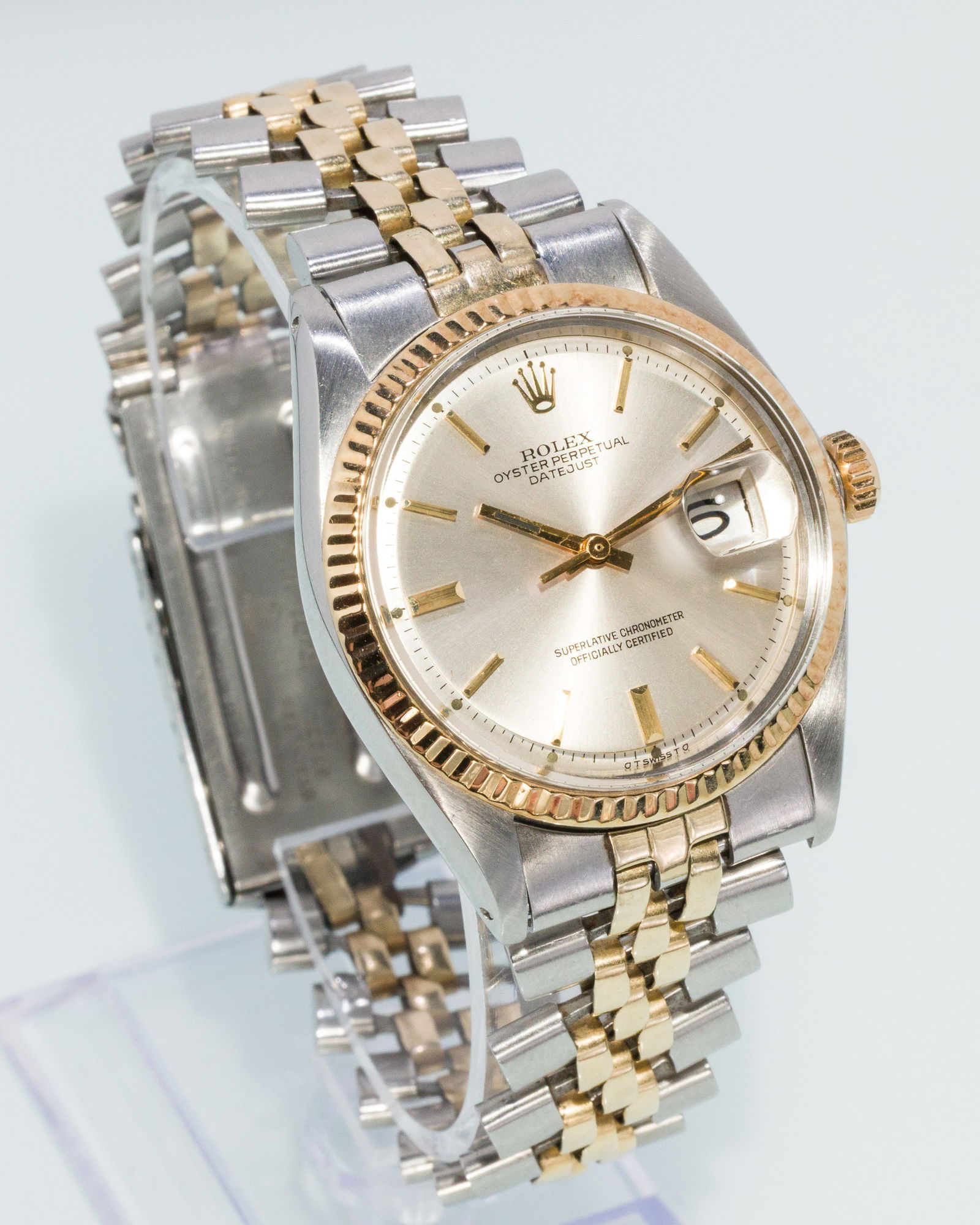 Two Tone Gentlemans Rolex Datejust: Property from the Estate of Edward David Johnson, Charlotte, NC & Hilton Head Island, SC Description: Two Tone Gentlemans Rolex Datejust, 14K yellow gold and stainless steel, the champagne dial wi