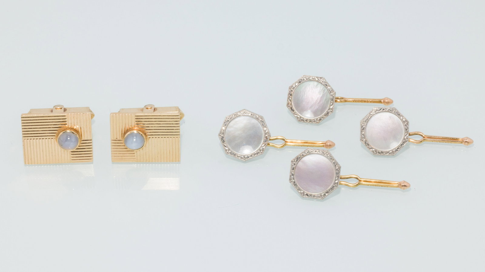 14K Cufflinks and Four Mother-of-Pearl Shirt Studs: Description: 14K Cufflinks and Four Mother-of-Pearl Shirt Studs, a pair of 14K yellow gold rectangular cuff links featuring opal cabochon (marked 14K) and a set of four 14K yellow and white gold