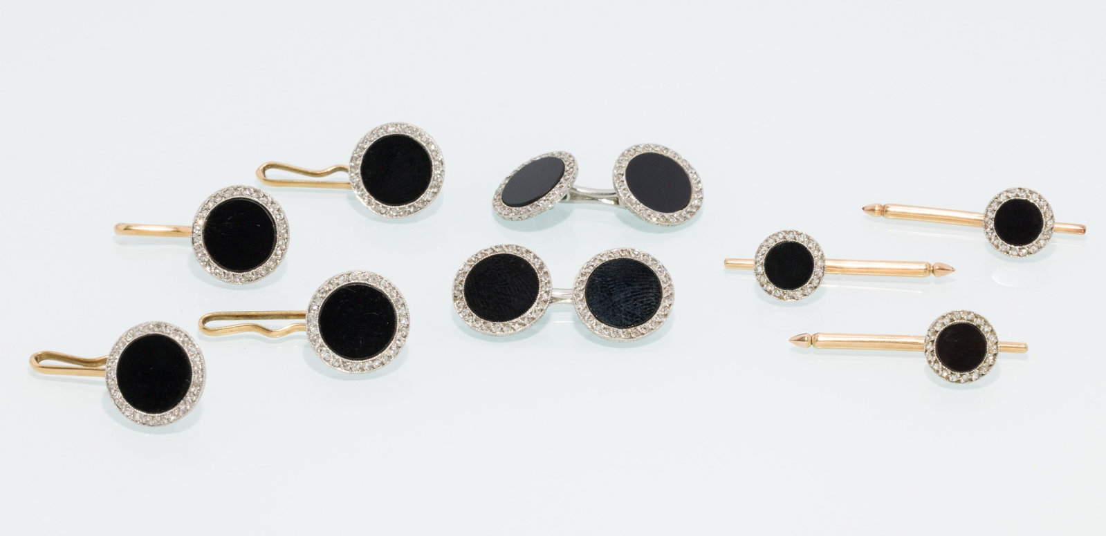 14K Gold, Platinum, Diamond & Onyx Gents Dress Set: Description: 14K Gold, Platinum, Diamond & Onyx Gents Dress Set, comprising a pair of cufflinks, three studs and four buttons, all in platinum with onyx centers surrounded by diamonds, the studs