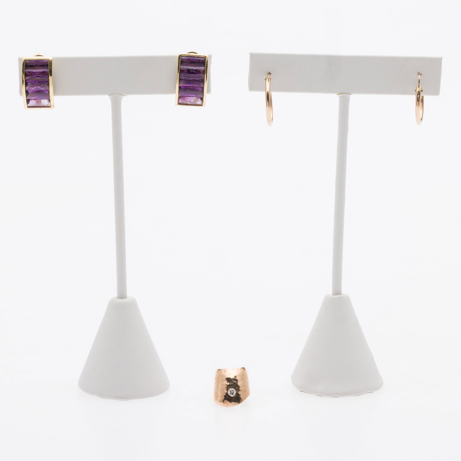 18K Amethyst Earrings, 14K Hoops & 14K Diamond Cuff: Description: 18K and Amethyst Earrings, 14K Hoops & 14K and Diamond Cuff, comprising a pair of 18K yellow gold and amethyst post earrings, marked 750 (11.35 grams overall); pair of 14K yellow gol