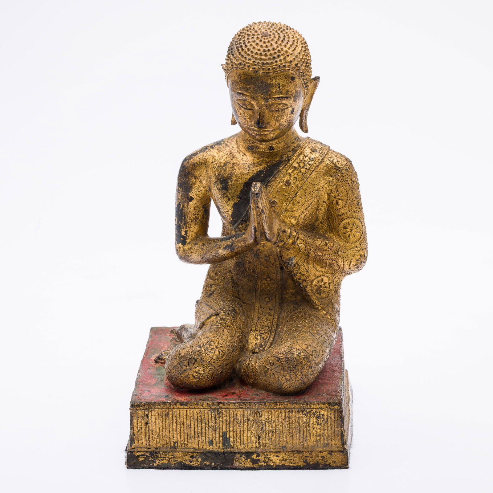 Thai Gilt Bronze Kneeling Figure: Property from the Estate of Arthur B. Kouwenhoven Jr., Savannah, GA Description: Thai Gilt Bronze Kneeling Figure, on a rectangular base. Measurements: Height: 10 1/2 in. x Widt